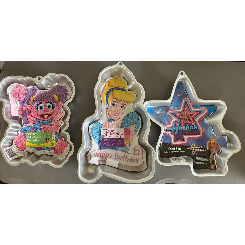Lot Of 3 Brand New Wilton Pan Sesame St. Cadabby Cinderella Hannah Montana